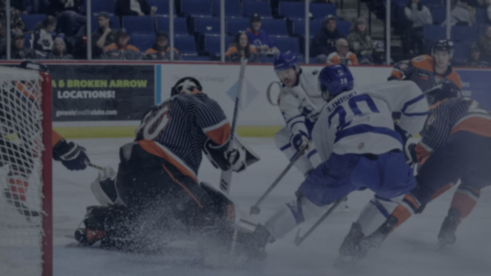 Thunder players battling in front of the net