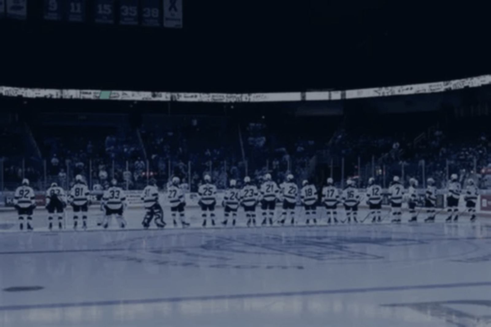 Thunder players lined up on the ice for the anthem